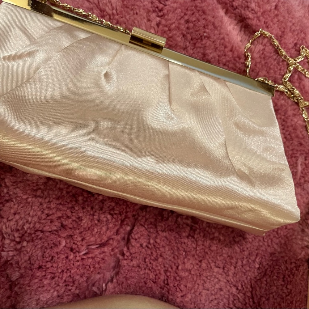 A silk David Bridal Purse has never been dyed and never used.